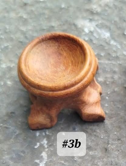 Support en bois pour sphère.