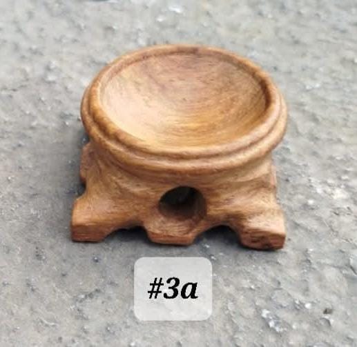 Support en bois pour sphère.