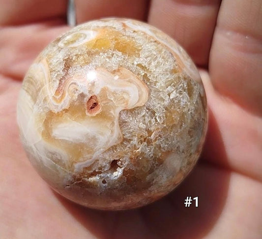 Esfera drusa de calcita ámbar